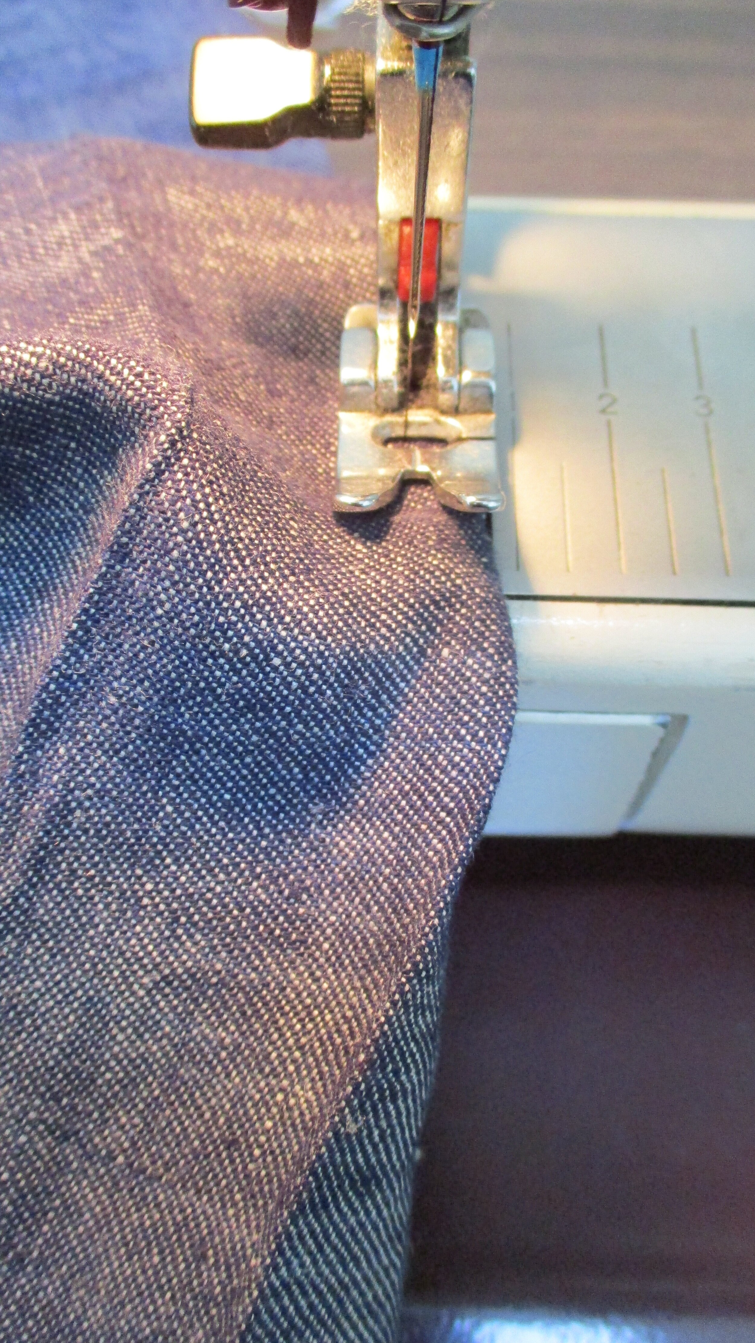  With pant leg folded right side out on a tuck fold-line, stitch a line 1/4” from edge.  