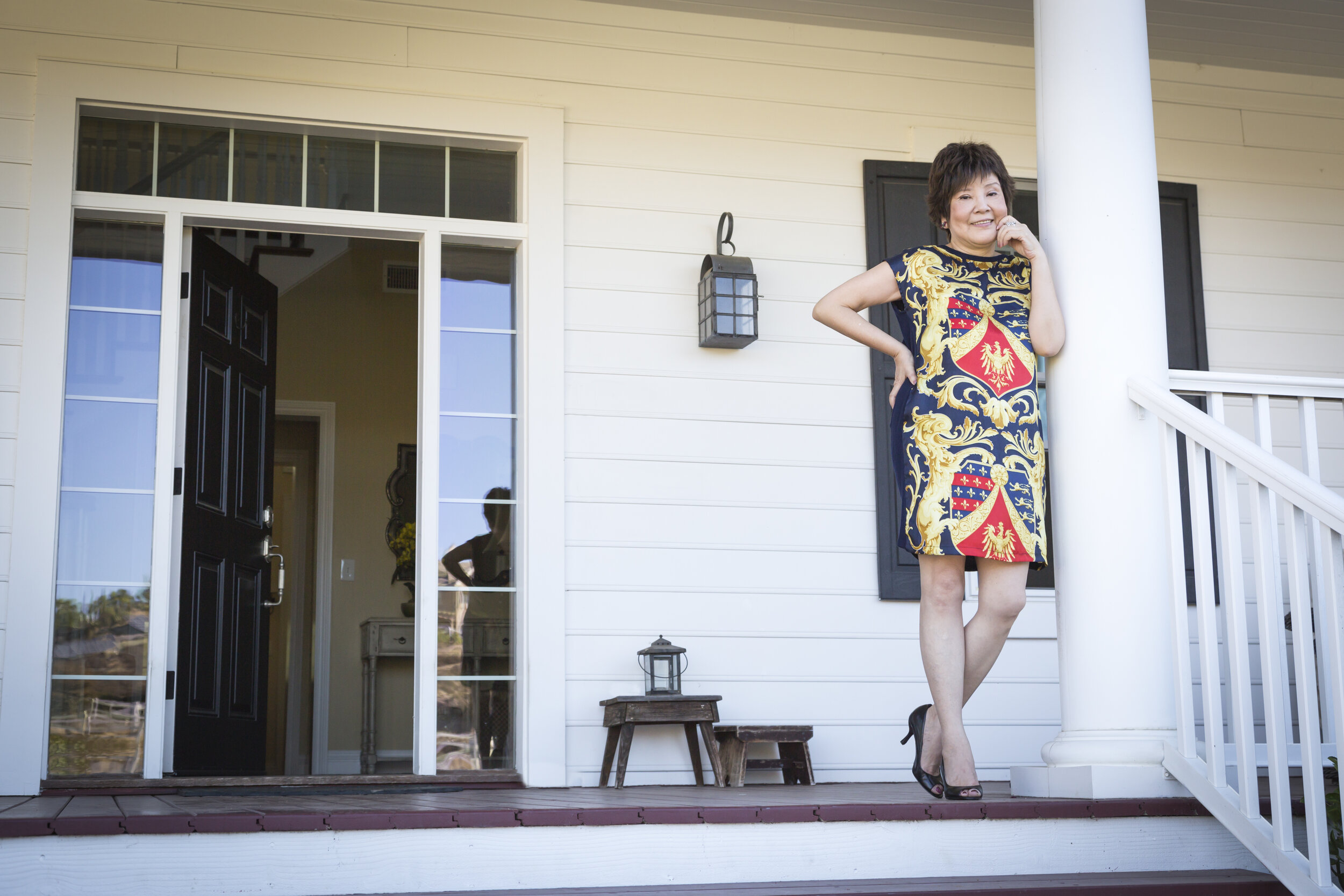 Attractive Chinese Woman On Her Front Porch
