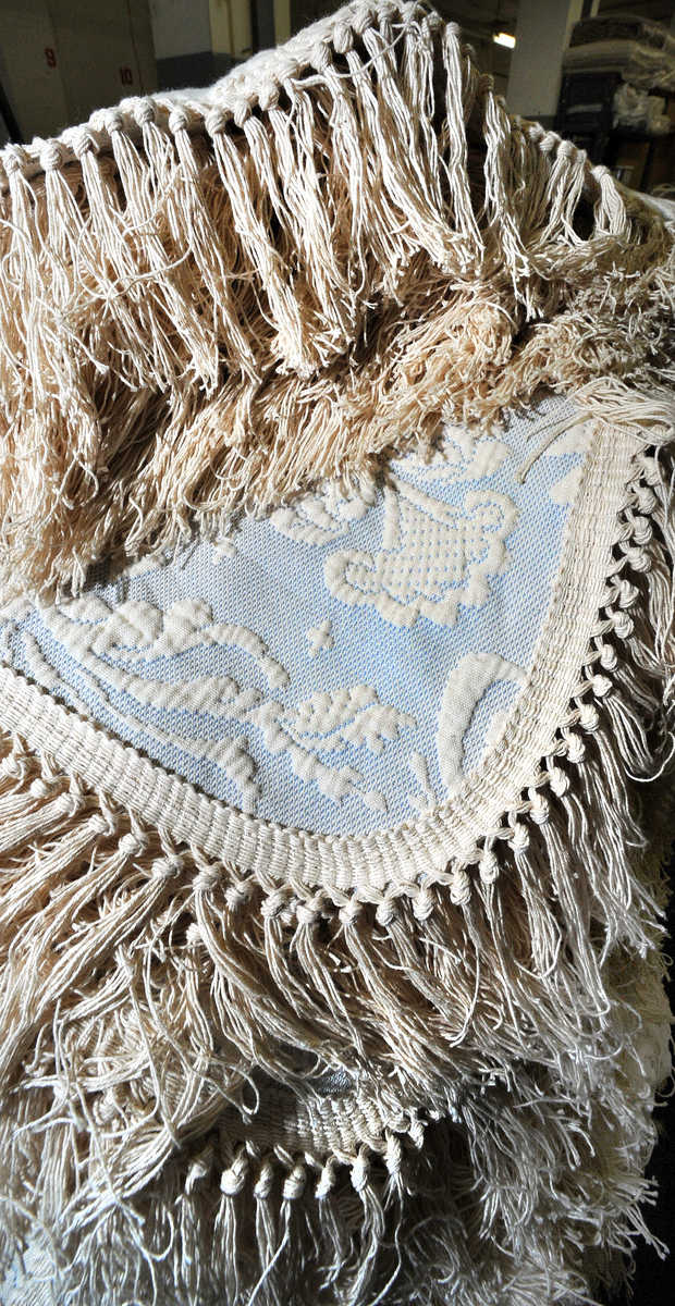 Pillow shams that have been washed await trimming, finishing and packaging at Maine Heritage Weavers in Lewiston. | RUSS DILLINGHAM/SUN JOURNAL