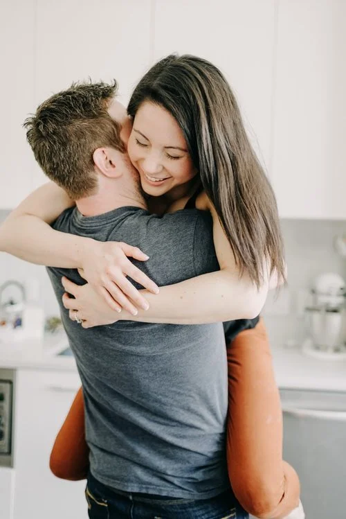 girl-jumping-onto-guy.jpg