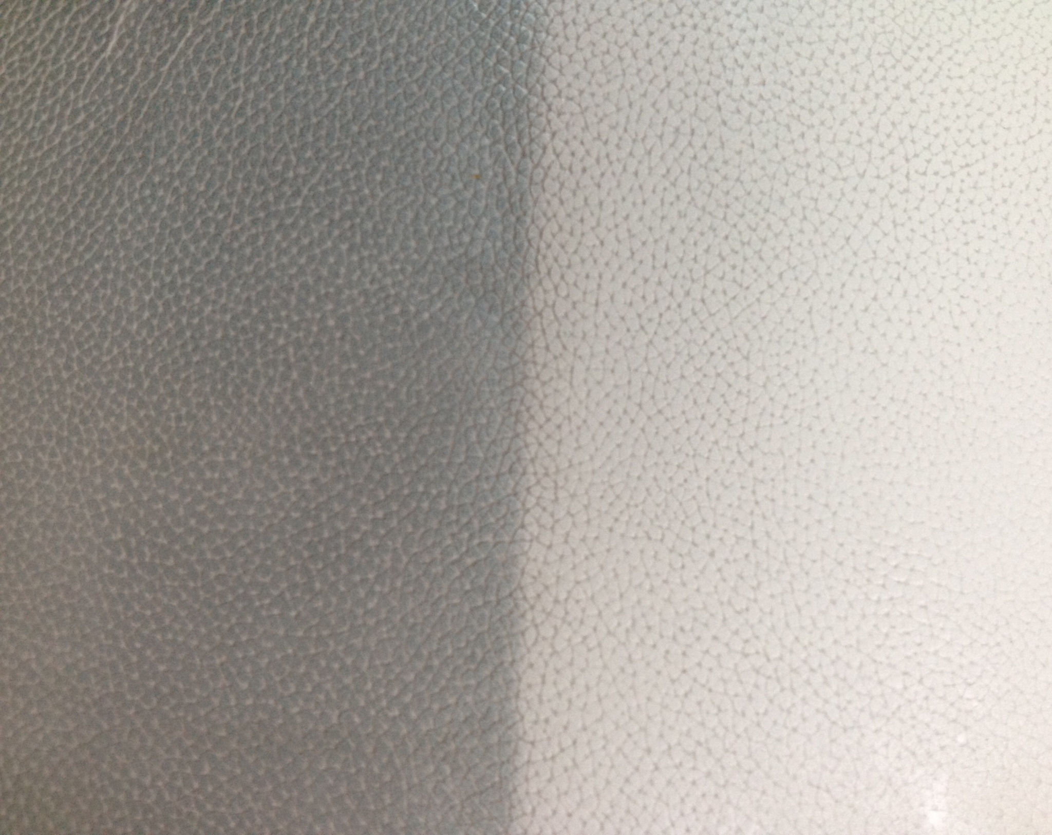 Leather Reconditioning - Before and After: This leather was filthy that it looked as if it were another color; and this is only after the first step of the process!