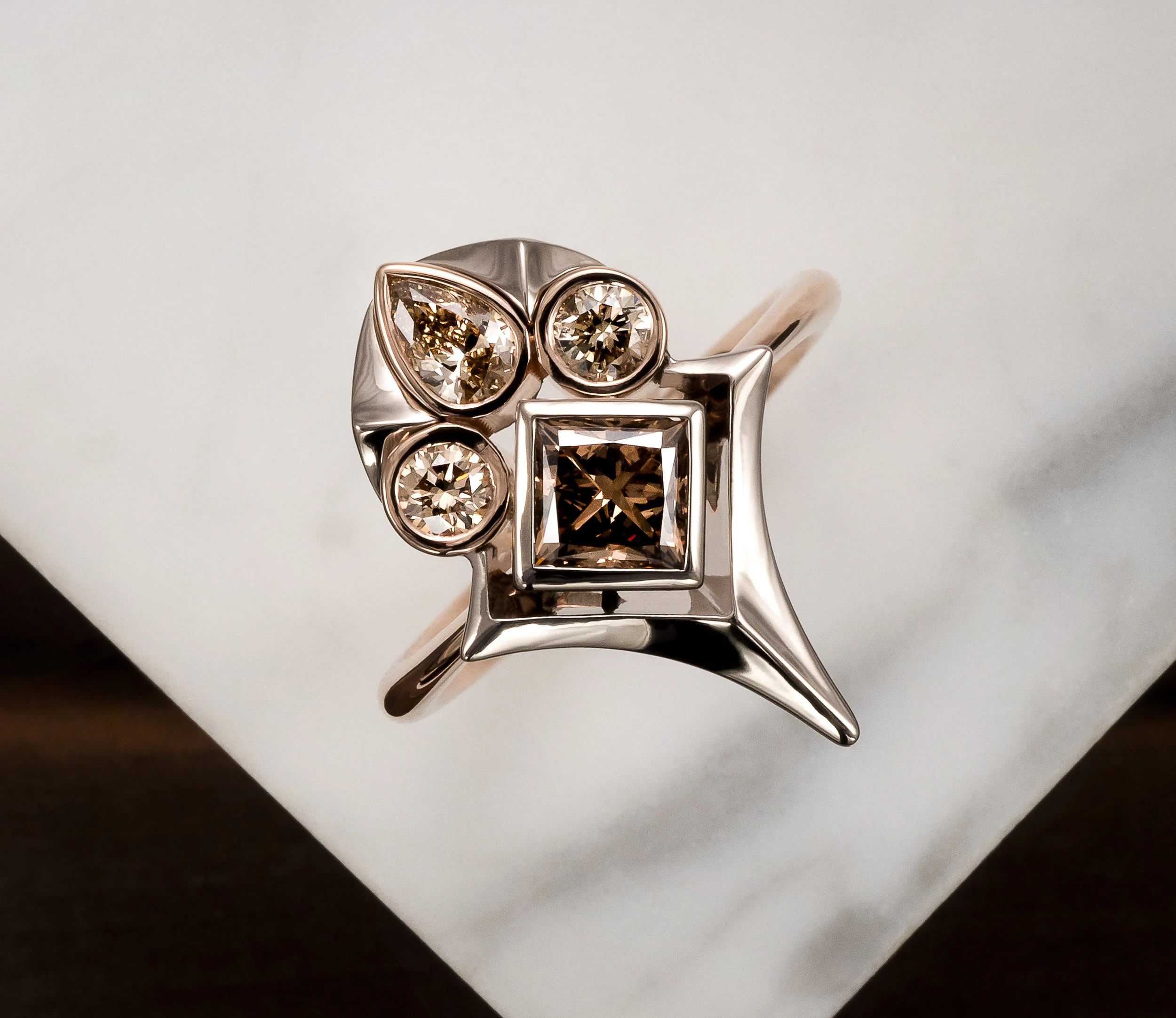 Warrior Princess Ring Princess cut cognac diamond (0.73ct) and champagne diamonds (0.36ct) set in 18k white and rose gold. Inspired by the spiritual armoury that we wear to protect our truth!