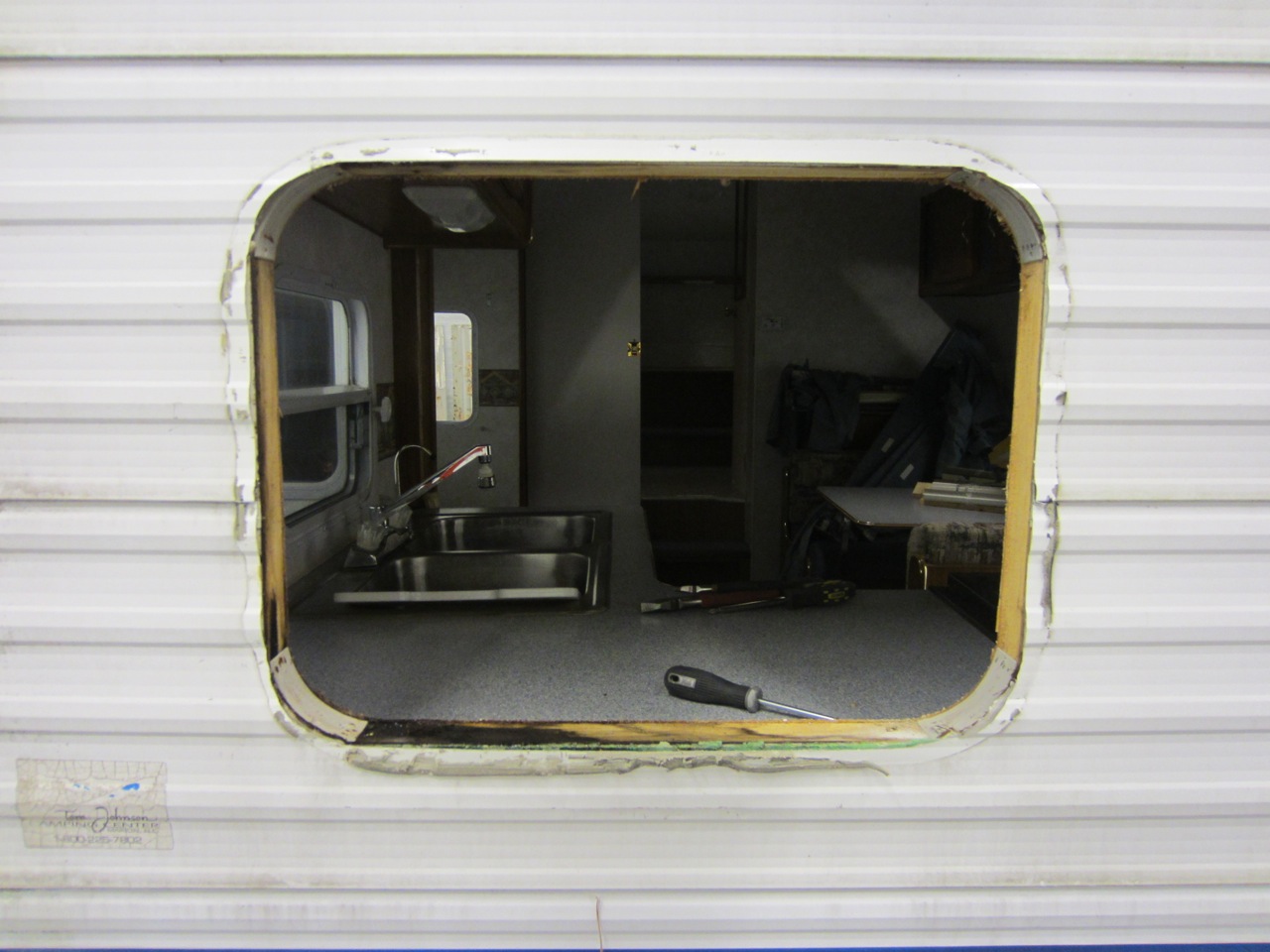  I removed all the windows from the RV so that we could take the sidings off. First surprise in the rear - a window frame is rotted. 