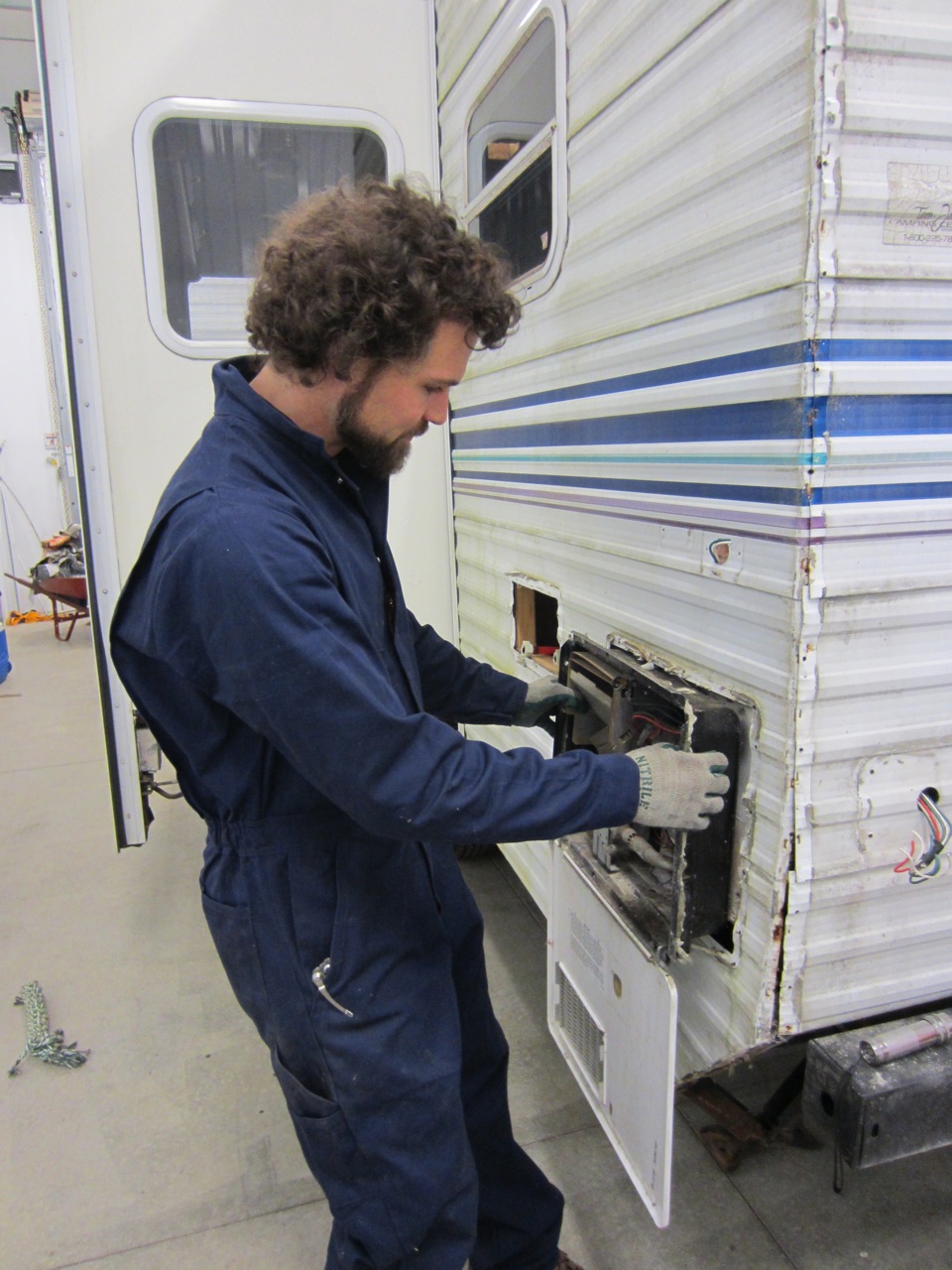  Removing the water heater. We plan on replacing it with point of use water heaters. 