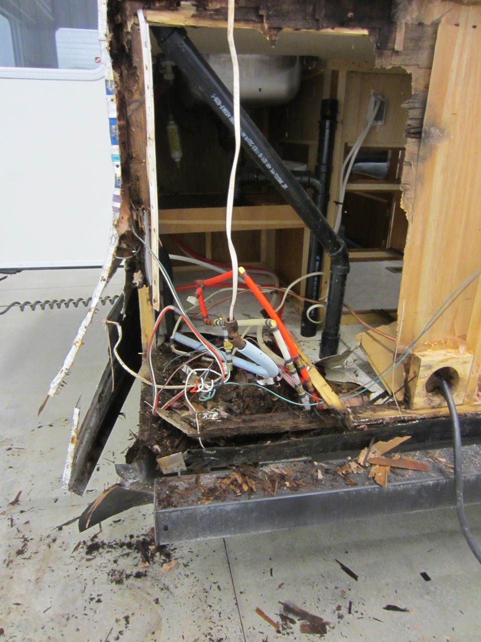  To top that off, we realized the area of the floor that the water heater sat on was also rotted. 