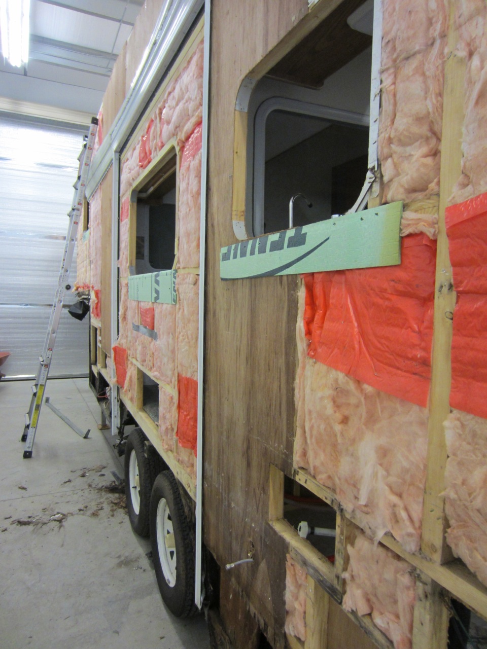  The original plan was the reuse the siding that we removed from the RV. But halfway through the teardown we realized that it would be hard to reuse it. The pieces of siding were deformed when removed and they weren't in the greatest condition to sta