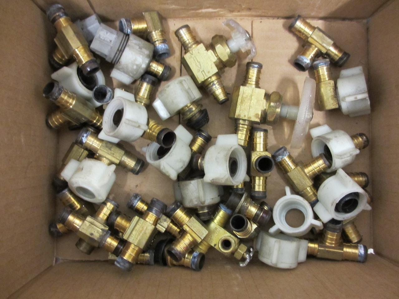  Box full of brass fittings to be reused. 