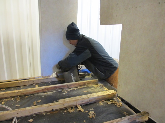 Each joist had to be sanded so the new sub-floor has something flat and even to lay on.
