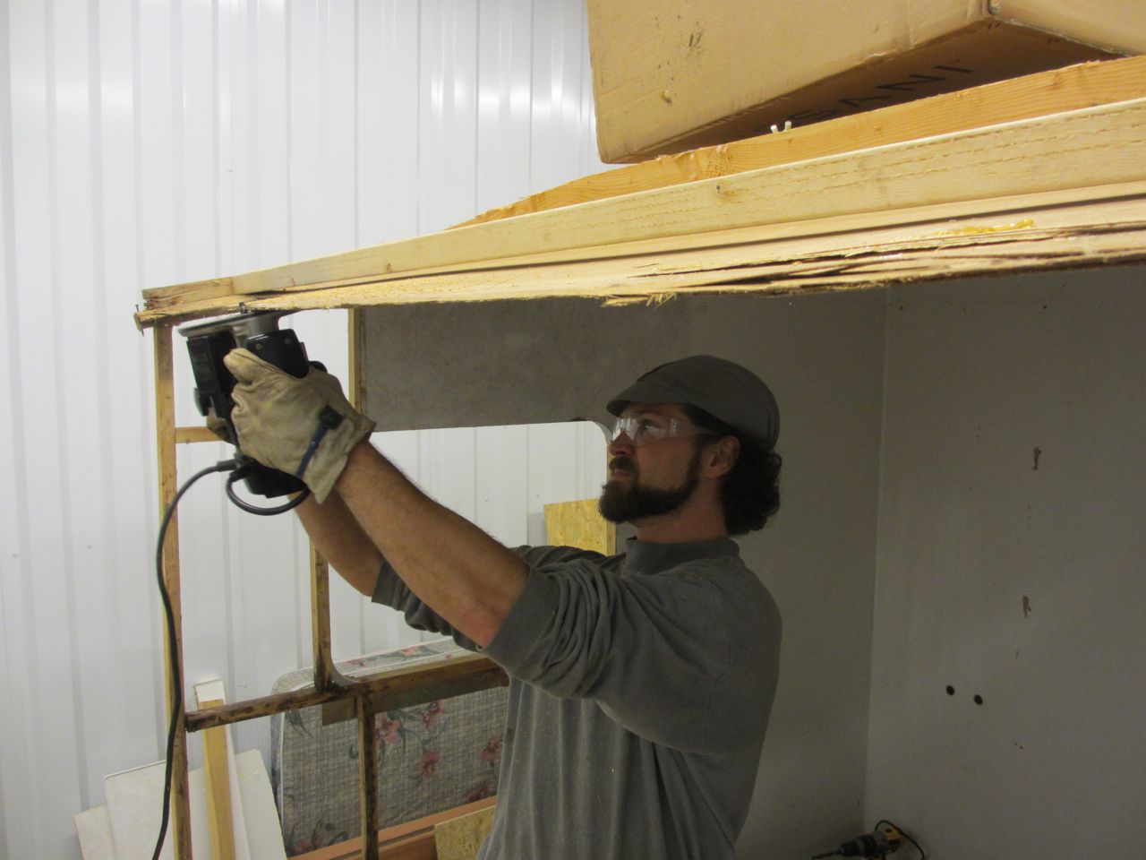 Clean up the roof by cutting the luan into a straight line.