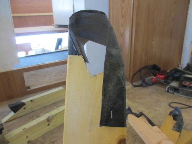 Just like we stapled underbelly wrap to the sill plates, we did the same for the bedroom front wall studs. We need to "protect" the studs because they sit against metal.
