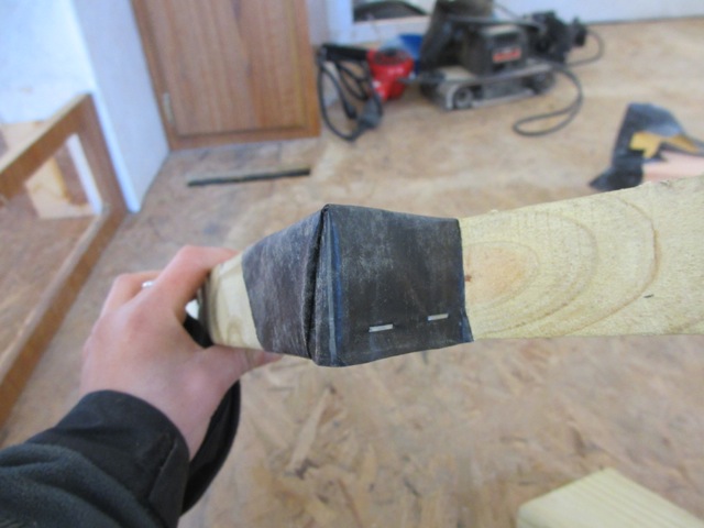 The underbelly wrap is tightly wrapped and stapled to the stud.