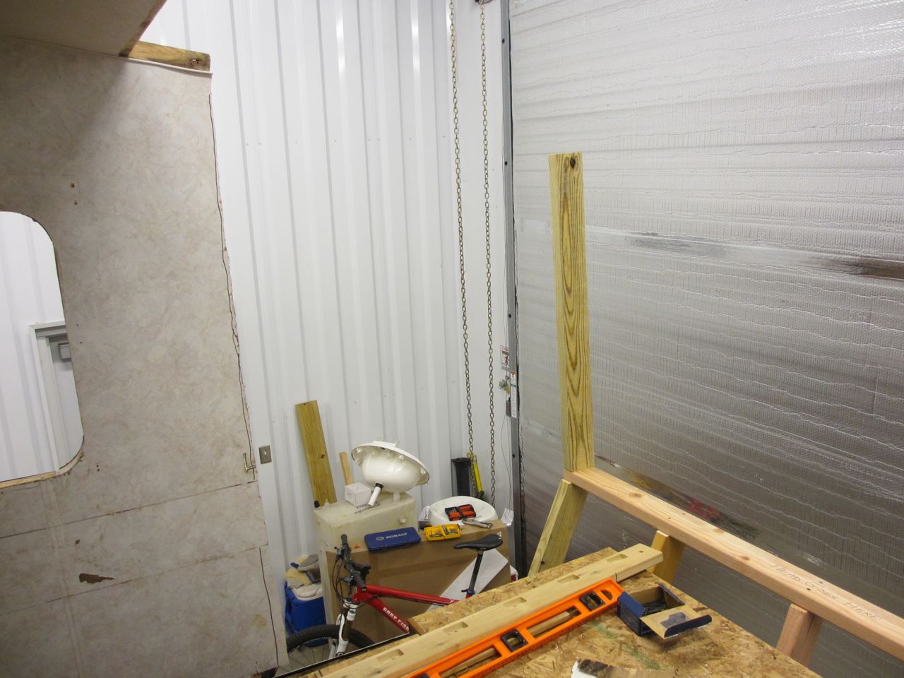 The front wall side stud is screwed in.