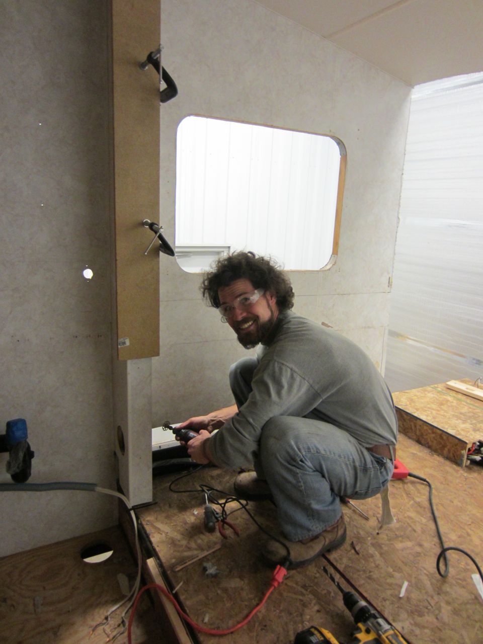 Jerud setting up to cut the divider wall out. Removing these two walls also means decreasing the overall RV weight!