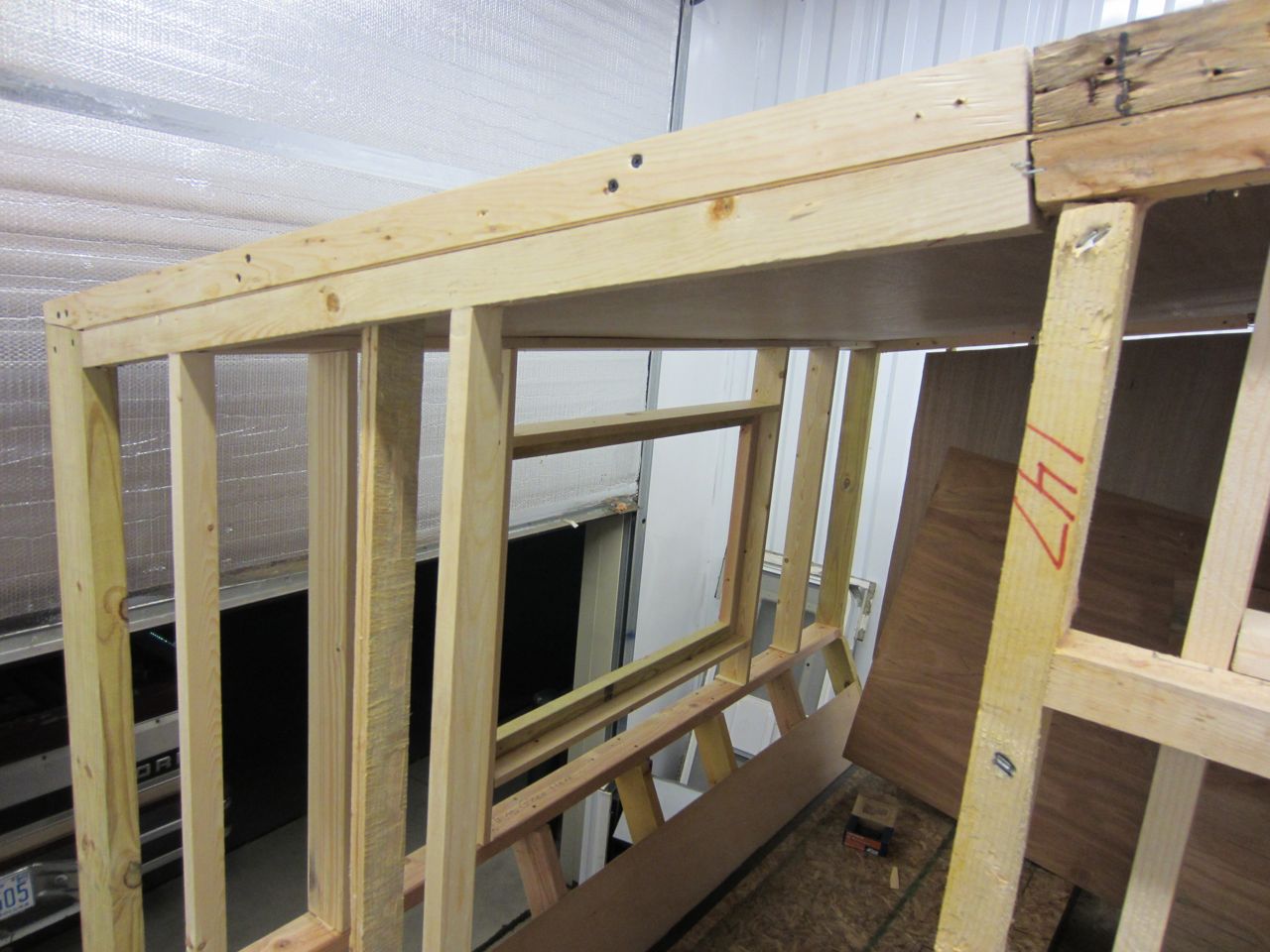 Side view of the roof frame. The luan is in-between the interior and exterior roof frame.