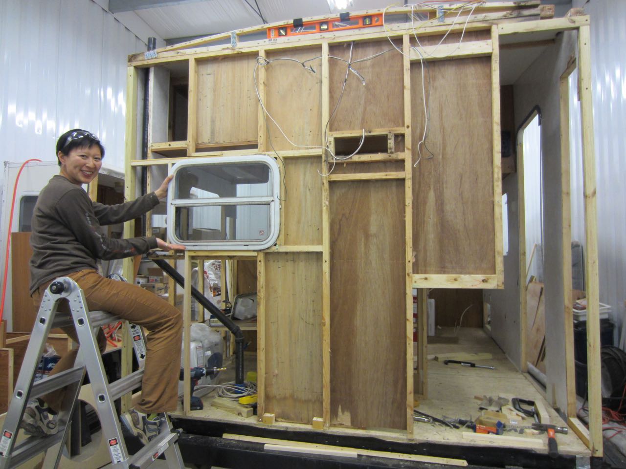  We finished up by installing the other vertical beam and the studs for the kitchen window. 