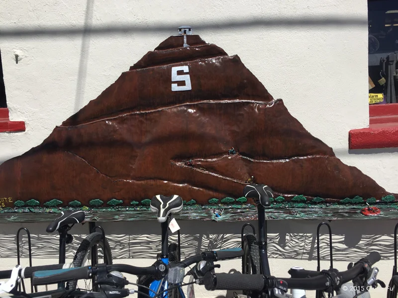 Cool metal artwork representing salida and all the outdoor activities outside Absolute Bikes.