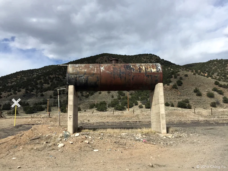 On CR 102 off Hwy 50 you will see this old tank with a tiny arrow painted on the concrete legs indicating BLM land is to the right.