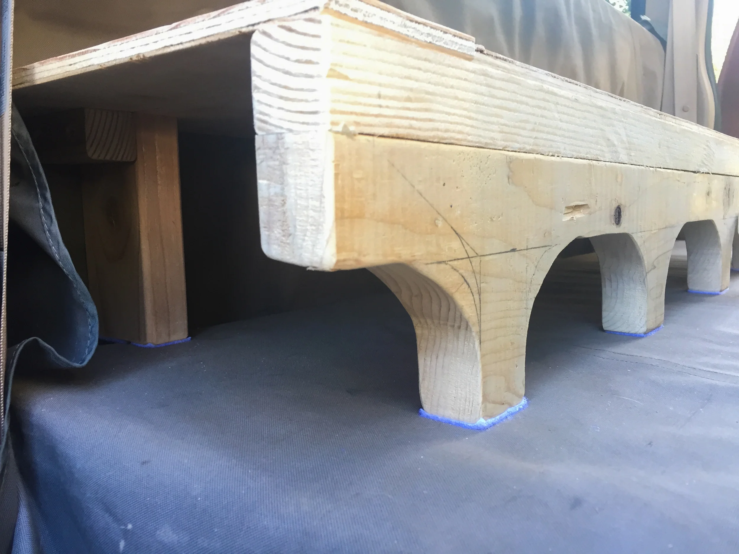 This is what the legs look like once in the truck. We rounded the bottom of the legs and taped it with felt pads to protect the cover underneath.