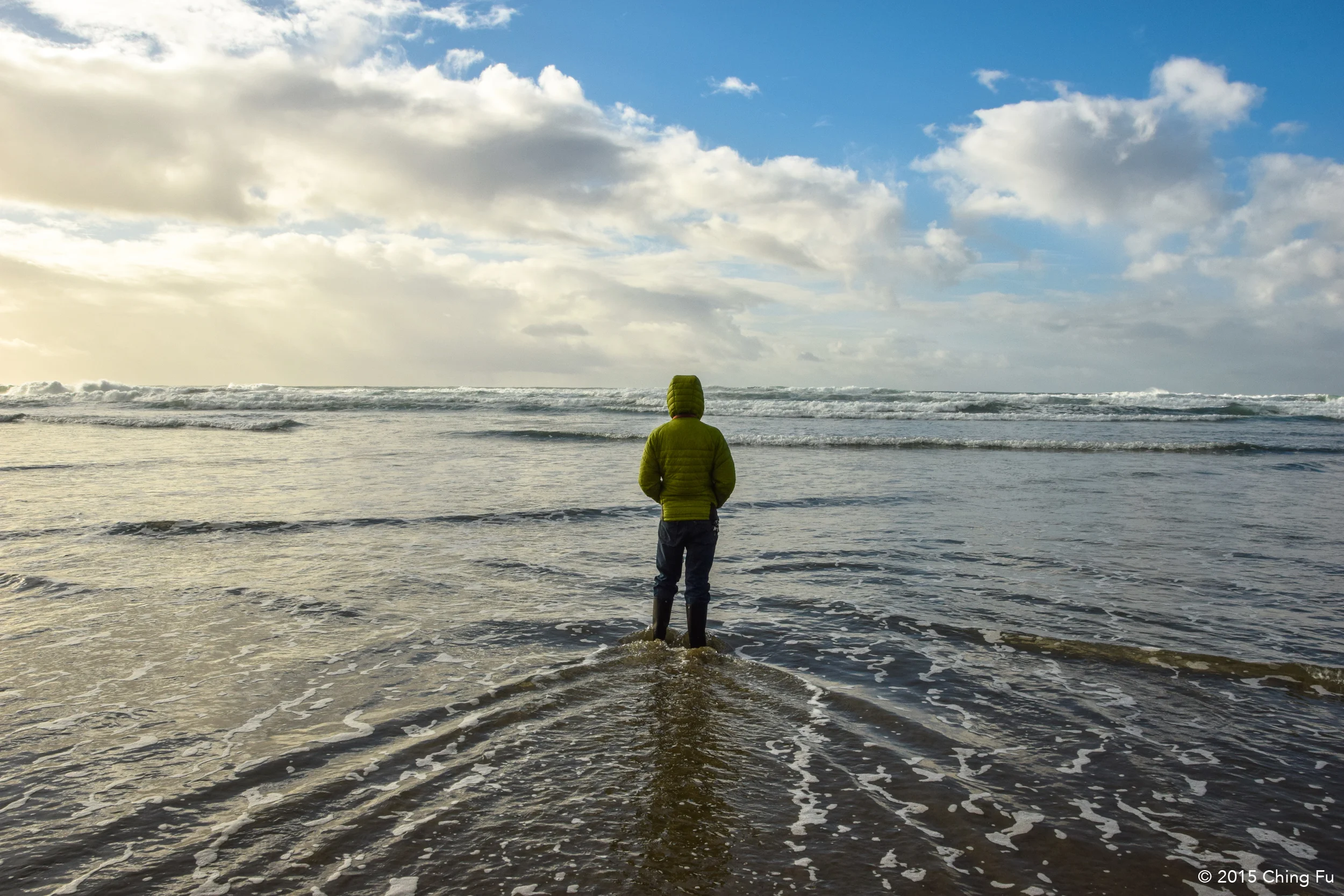 Jerud standing in the Pacific Ocean.