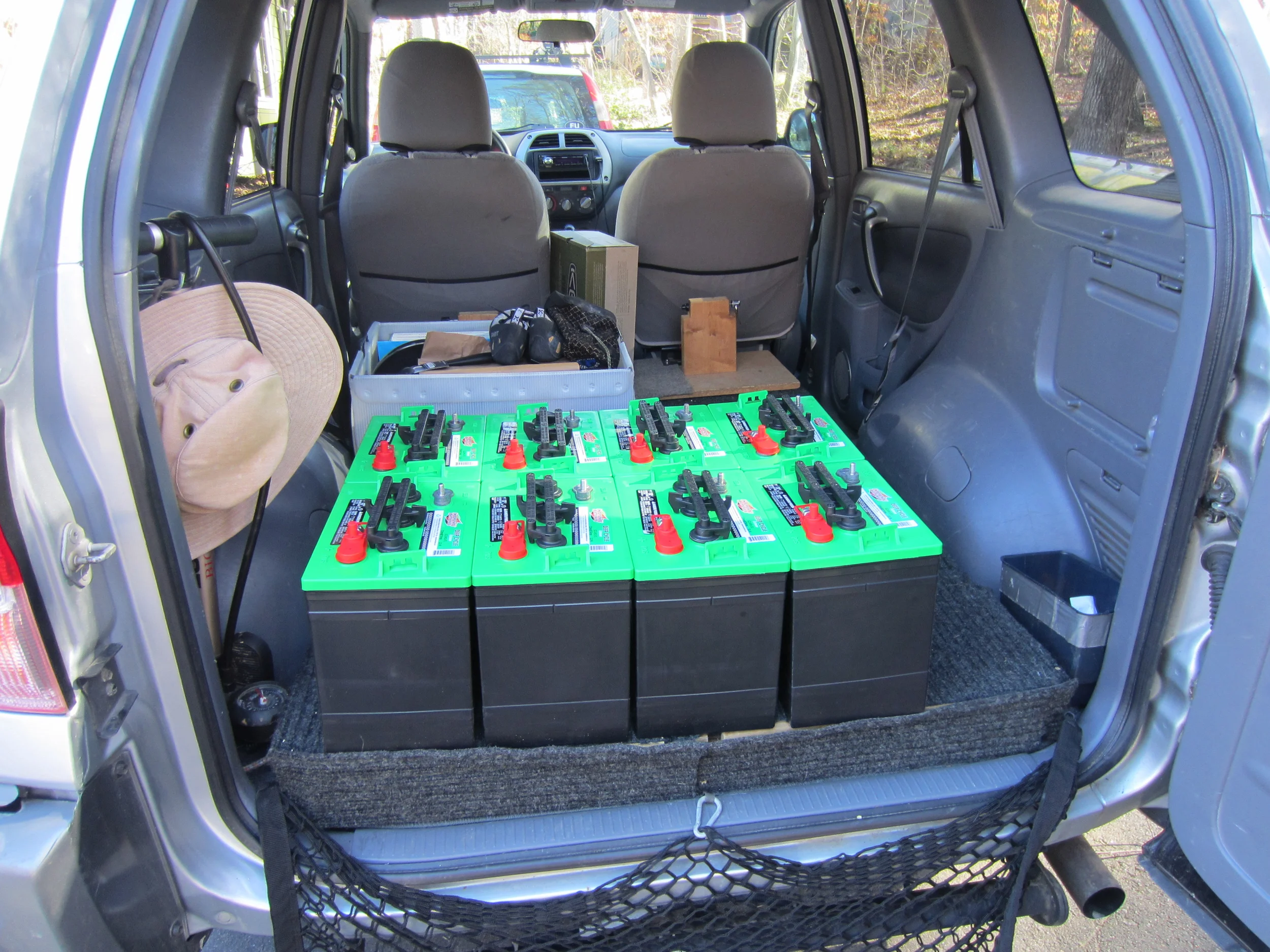 Bringing our newly purchased batteries home.