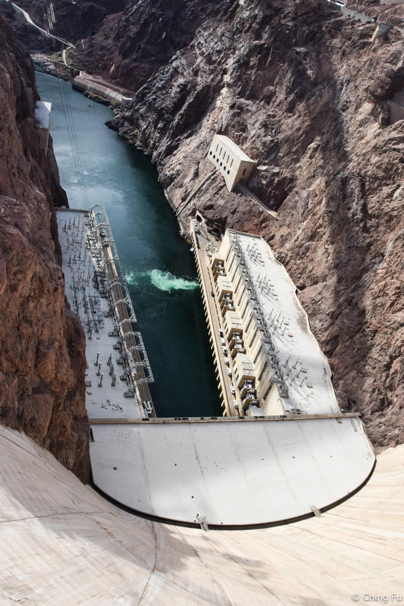 View of the Colorado River while standing at the top of the dam.