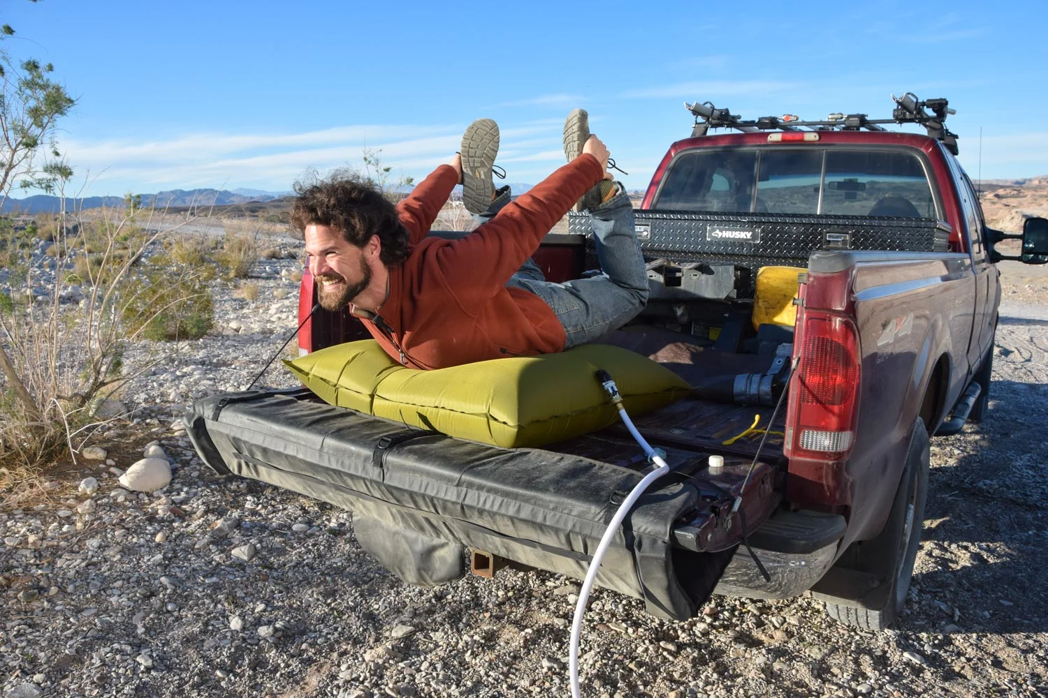 Jerud laying on top of our AQUATANK2 water bag.