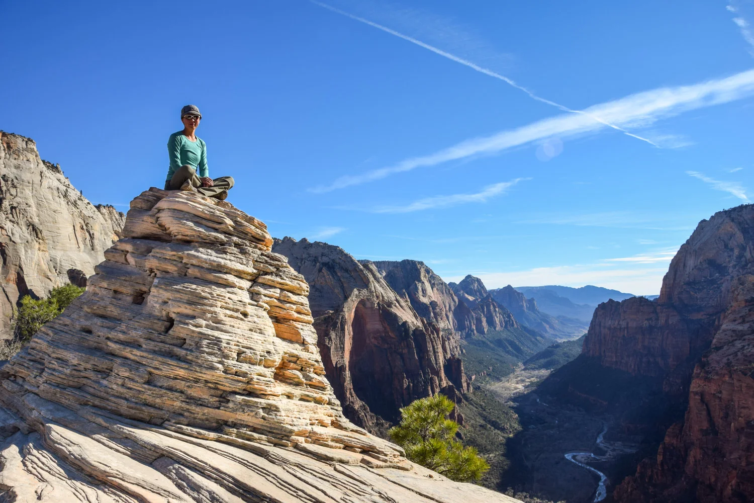 At the top with Zion Canyon in the background.