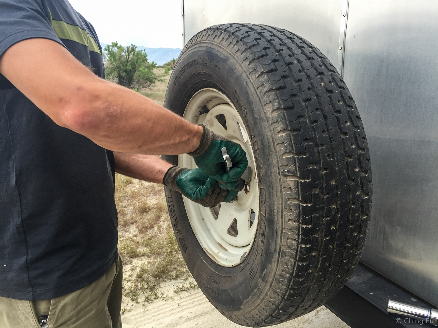 Step #9: Remove and install the spare tire onto the hub.