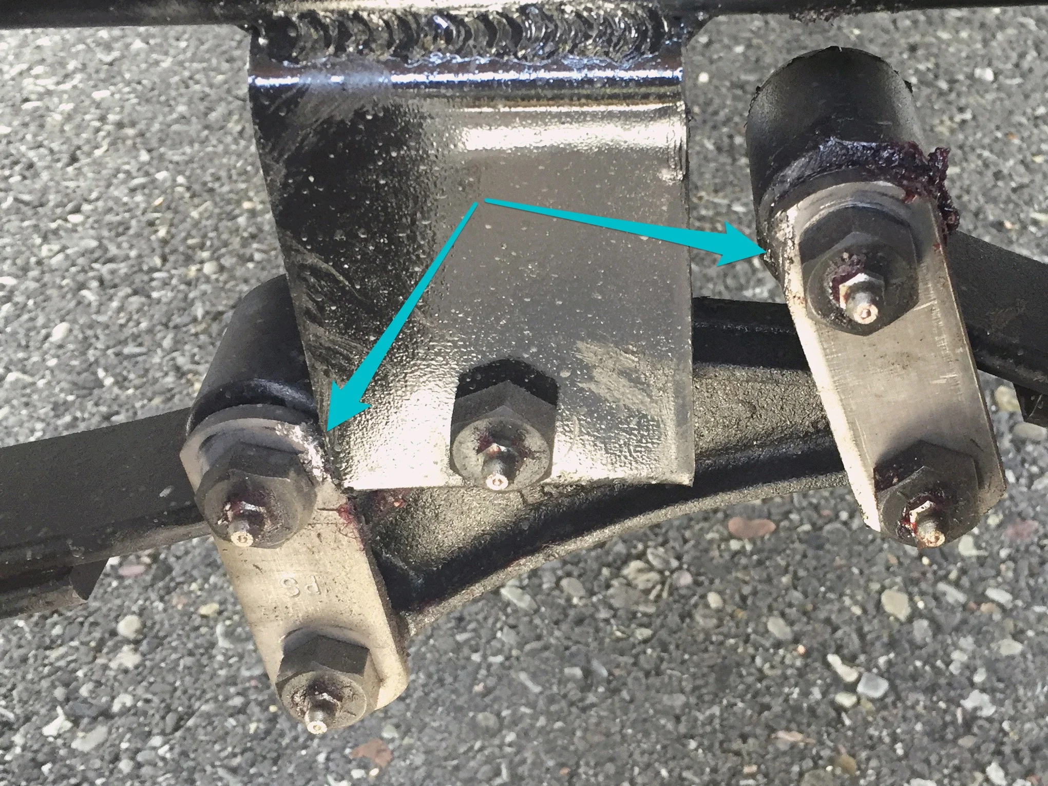 The shackle straps were getting worn away right at the pivot, by the hanger bracket. You can see here that we also upgraded our pivots to "wet bolts" when we did the upgrade.