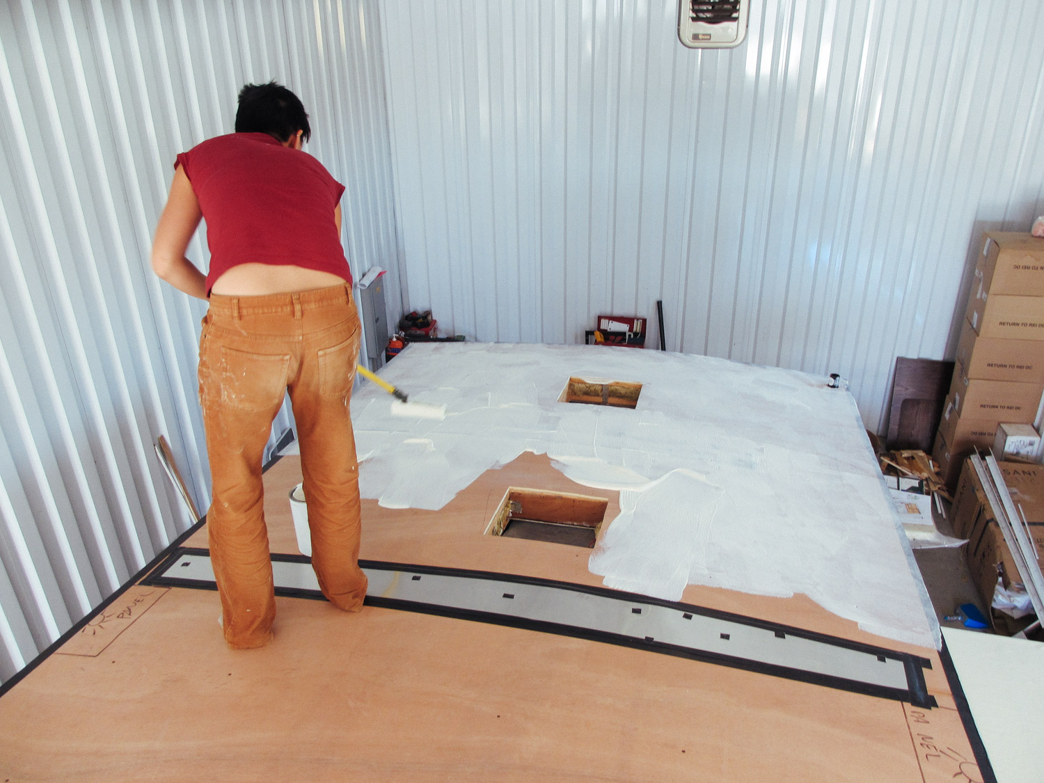  The same process we used to put the rubber roof membrane on the slide was used on the rest of the RV's roof. 