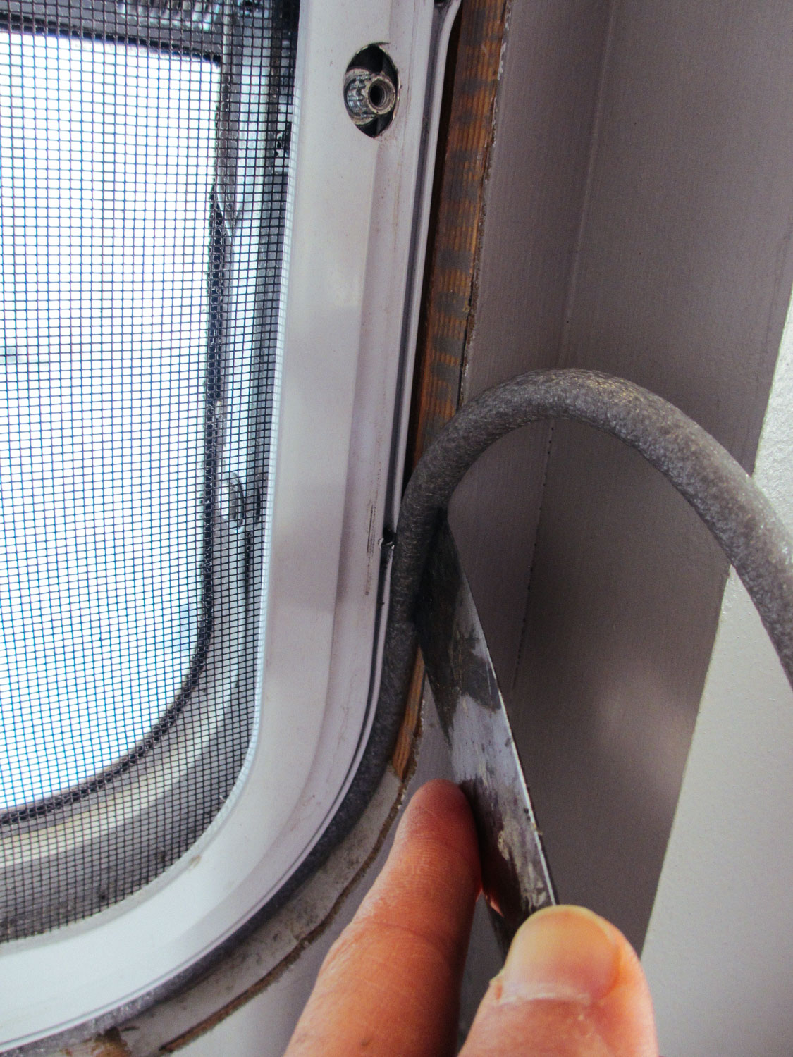  When the windows were reinstalled throughout the rig, we stuffed insulation tubing in the gap between the window and wall. 