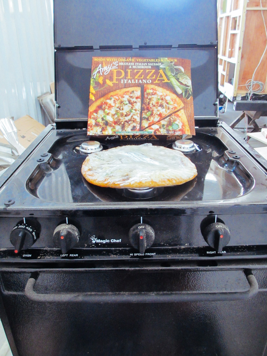  We made sure the RV stove/oven could actually run of camping propane fuel bottles by heating up a frozen pizza. 