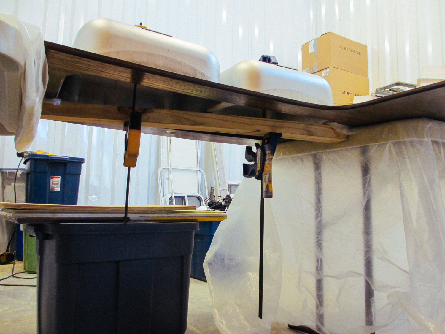  The original kitchen sink was top mounted to the countertop. We converted it to under-mount. 