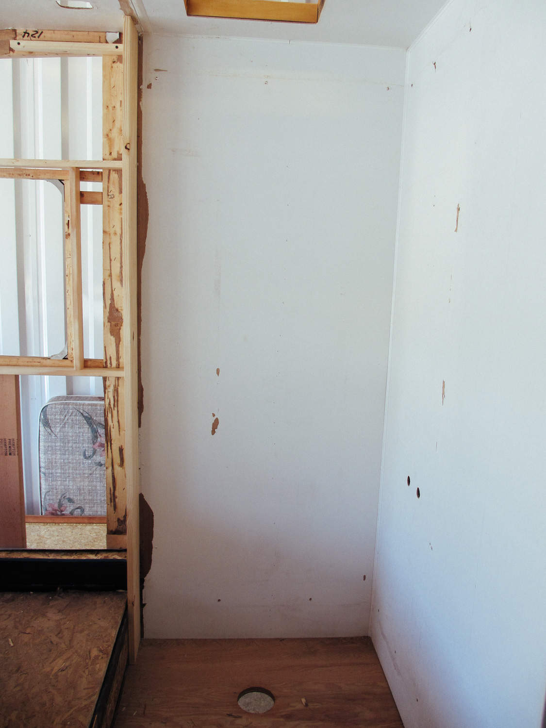  We also removed the shower and the wall that separated the shower and the bedroom. 