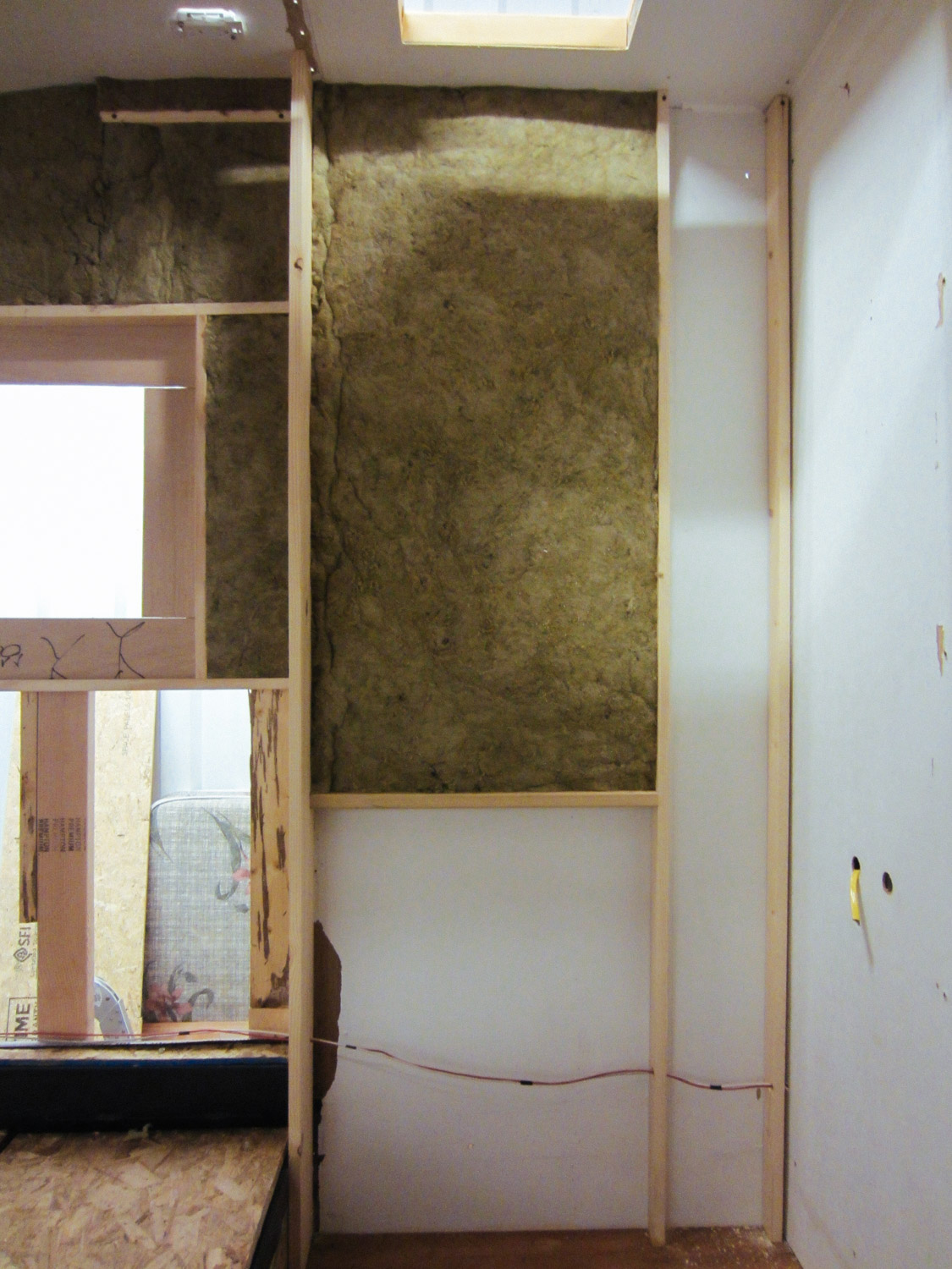  We added studs to the shower wall so we could insulate that space with mineral wool. 