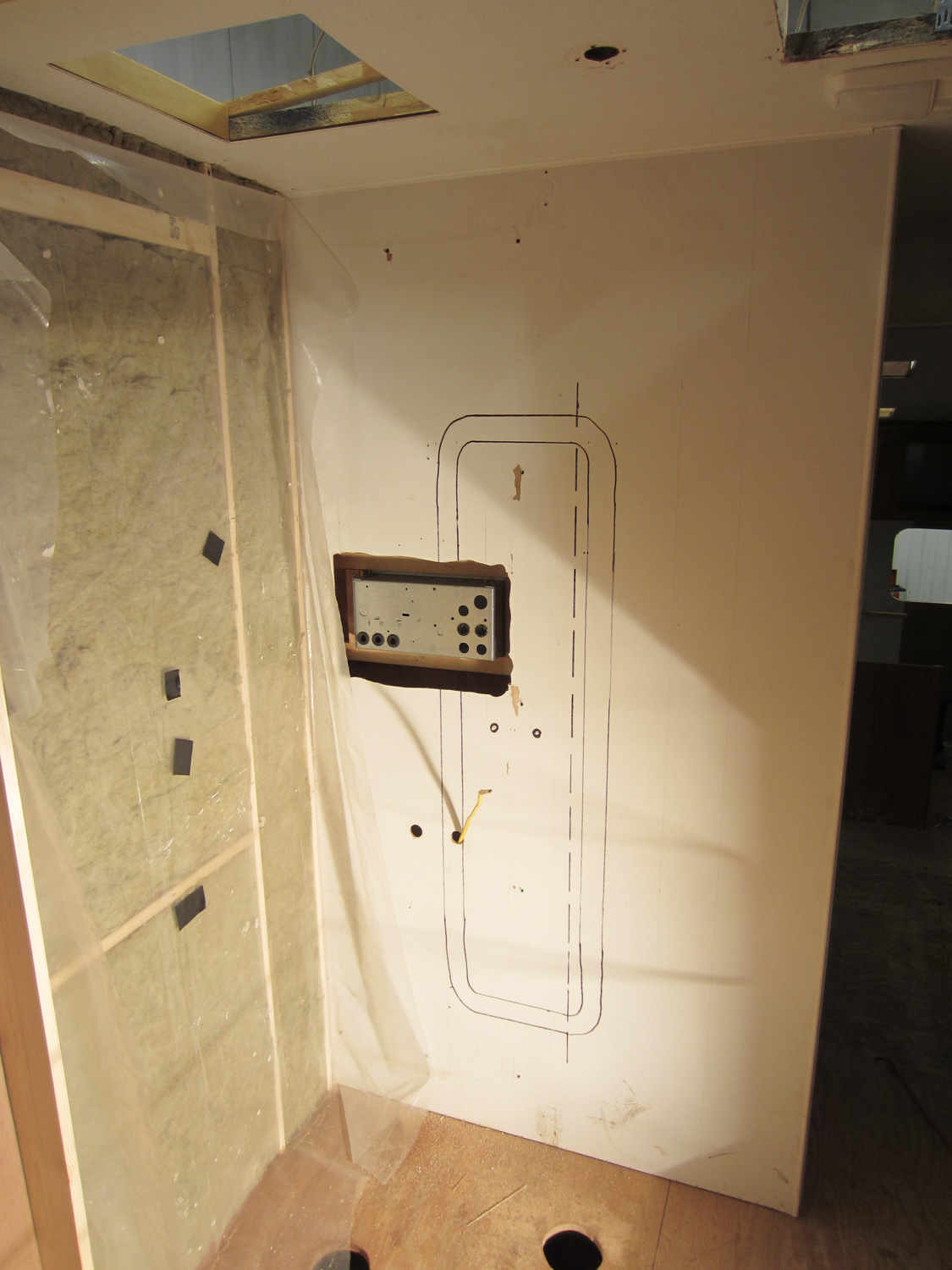  We moved the distribution panel from underneath the fridge to the wall between the shower and the toilet. 