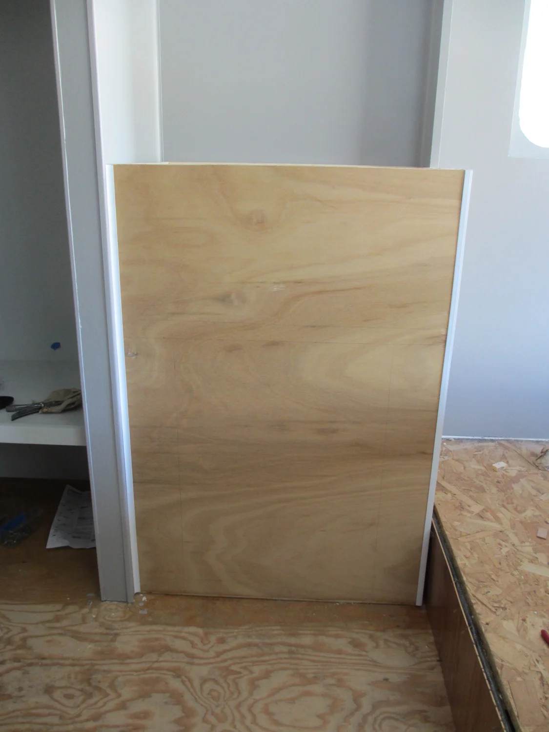 The bathroom cabinet with sides on.