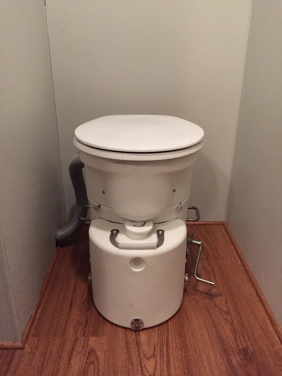 Instead of a traditional RV toilet, we installed an Air Head composting toilet.