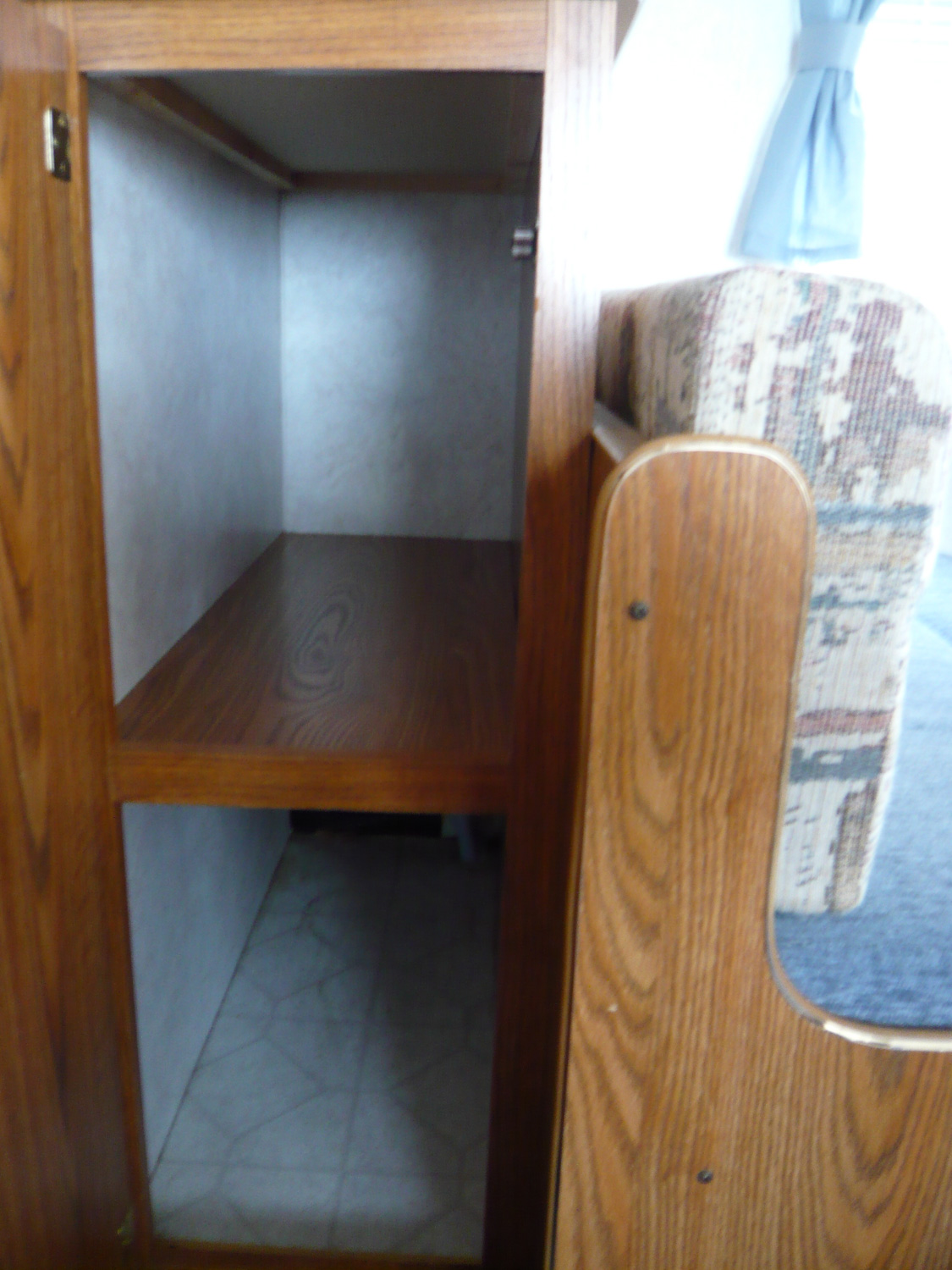  We have a pantry behind one of the dinette seats. 