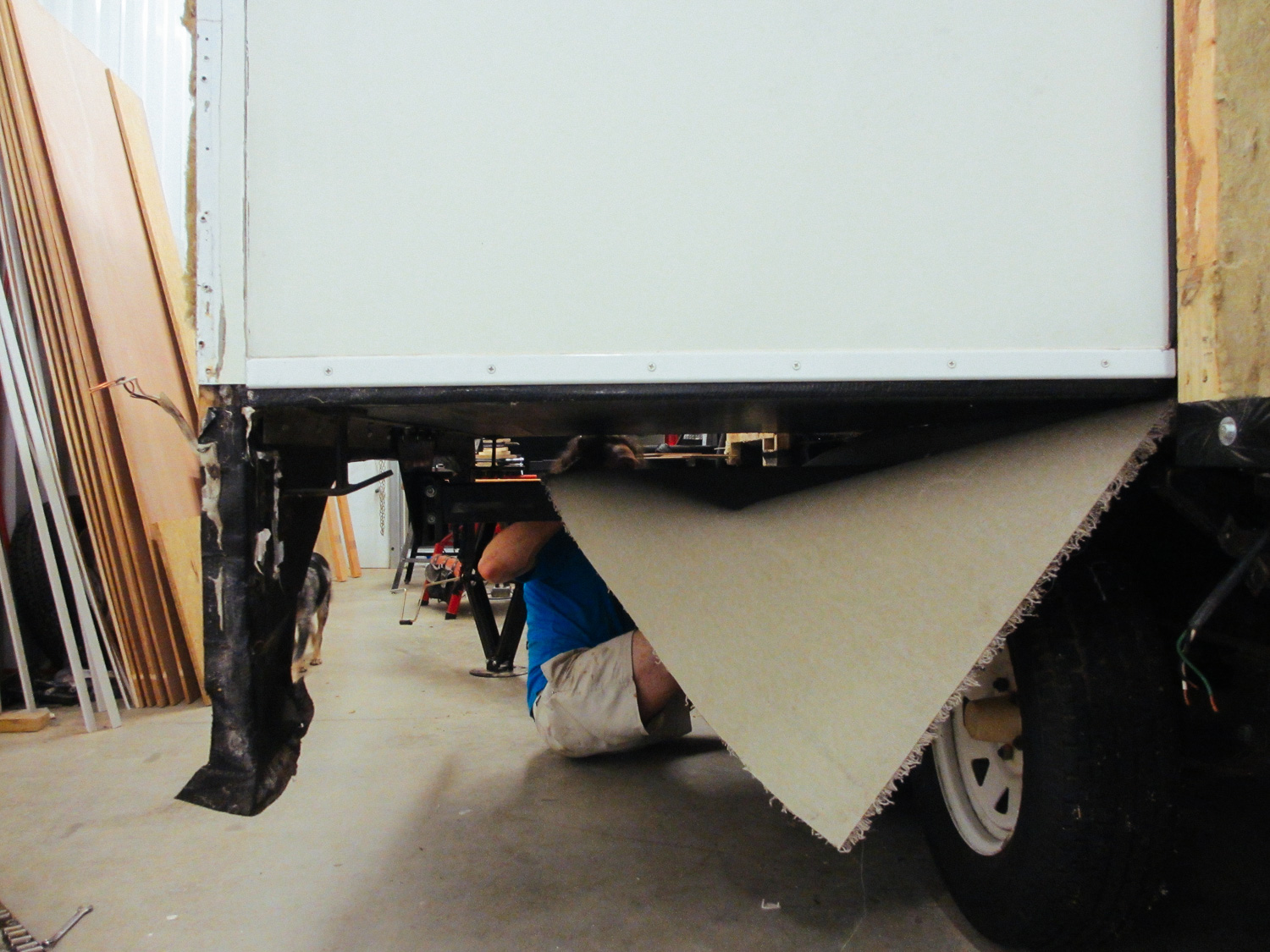  The carpet was installed so the slide could  slide  over the hardwood floor when it was retracted in. 