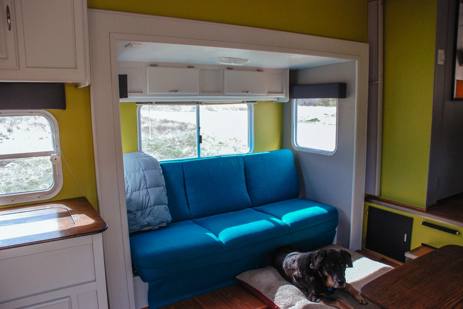 The newly reupholstered couch in the finished slide.