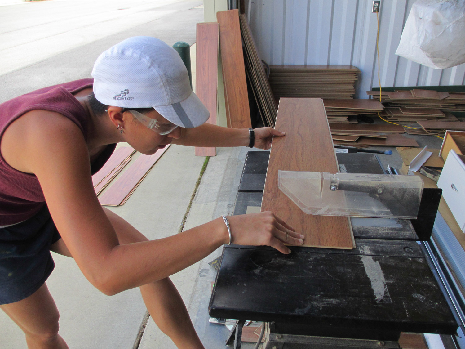  The table saw was used to cut laminate floor pieces to length. Our table saw was extremely ghetto and we're so lucky to still have all of our fingers. 