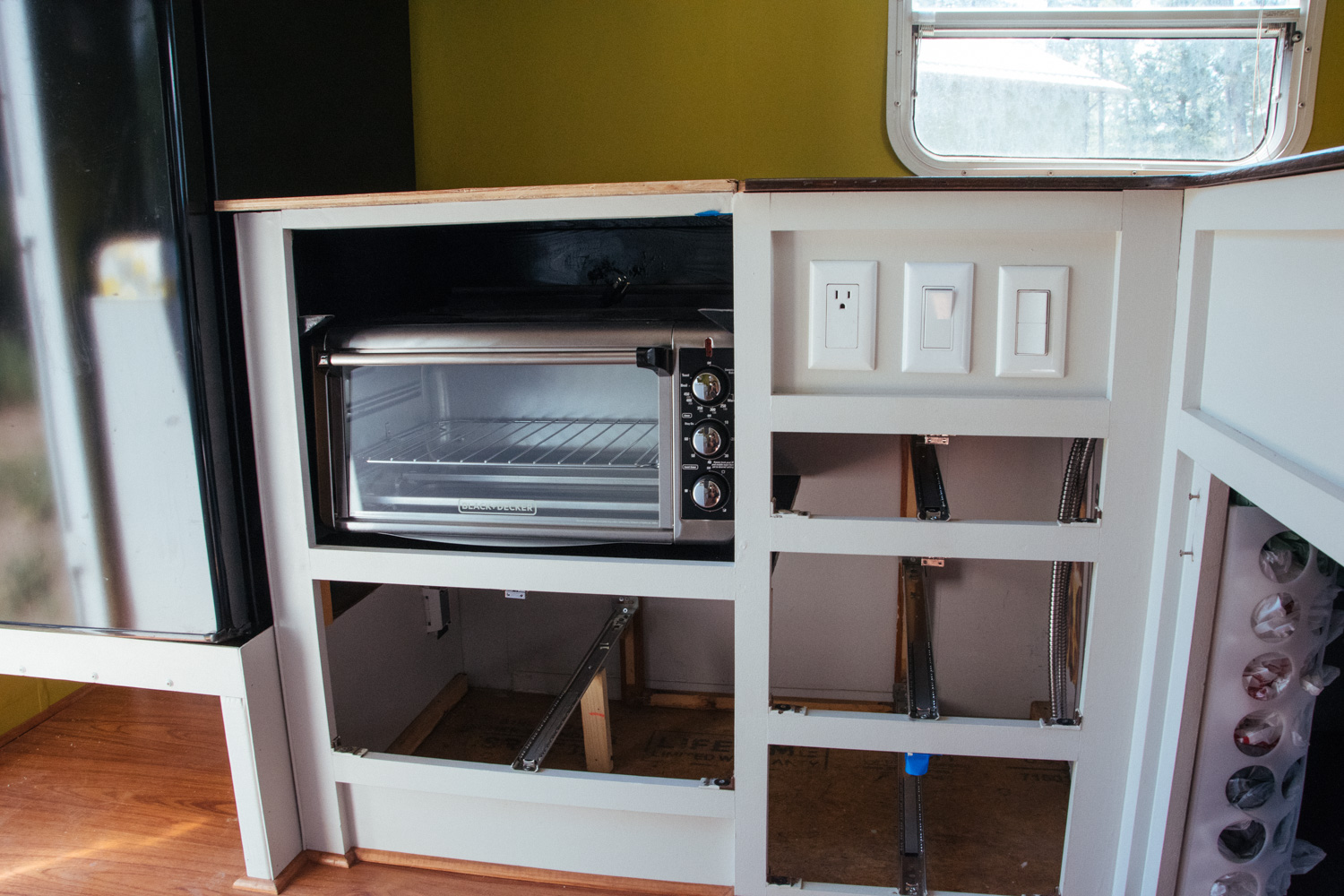  Our new electric oven is actually an extra large countertop toaster oven. We also use an induction countertop cooktop. 