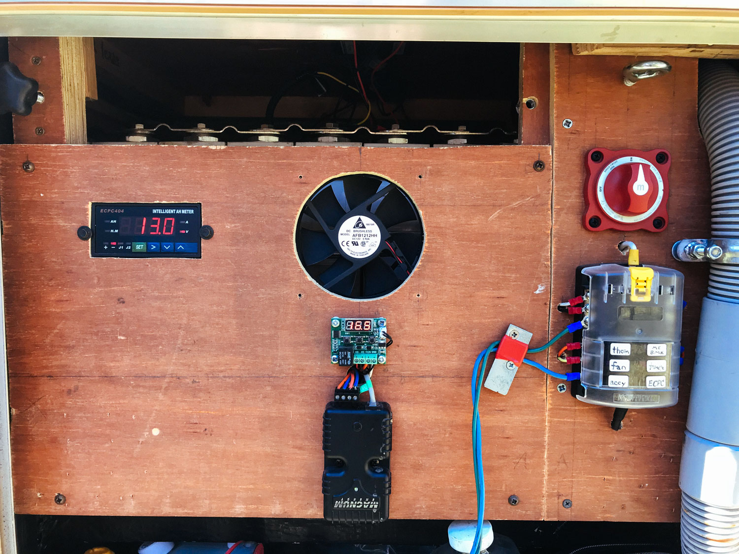  This is the first edition of our "BMS panel" (battery management system), mounted on plywood from the battery shipping crate! 
