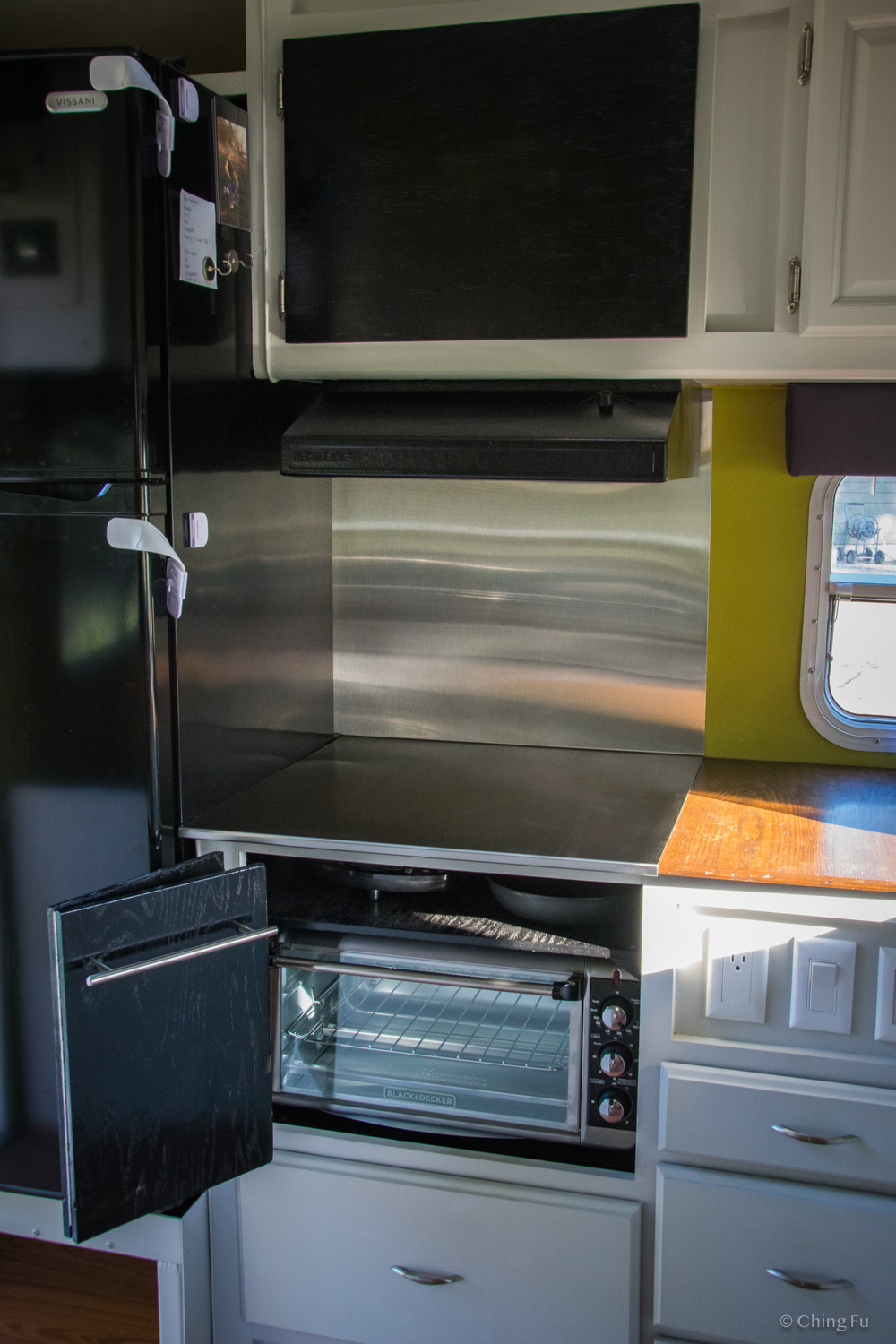 Part of our kitchen. Our induction cooktop is stored above the toaster oven.