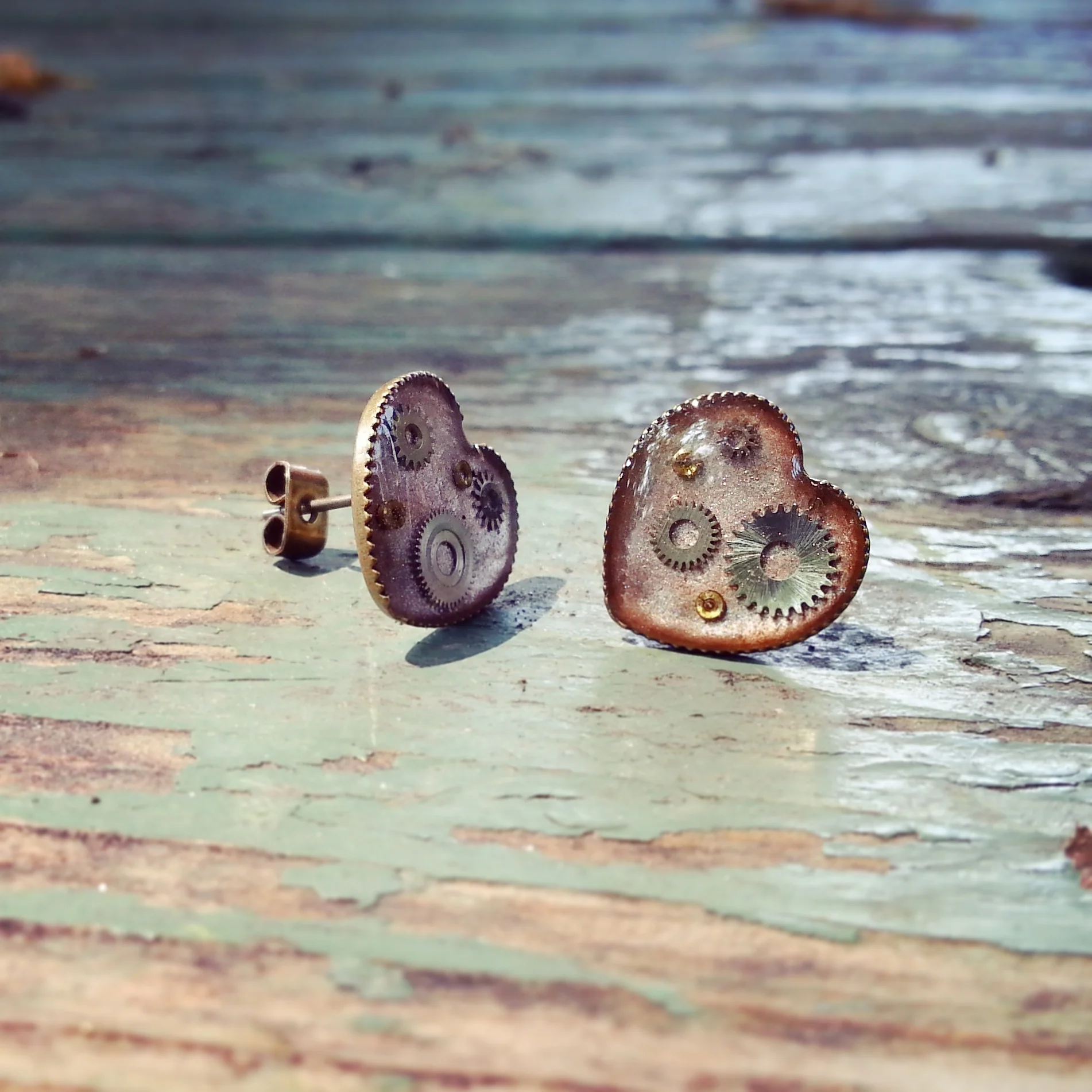 Pink Mechanical Heart earrings - hand painted background with resin coated watch parts.
