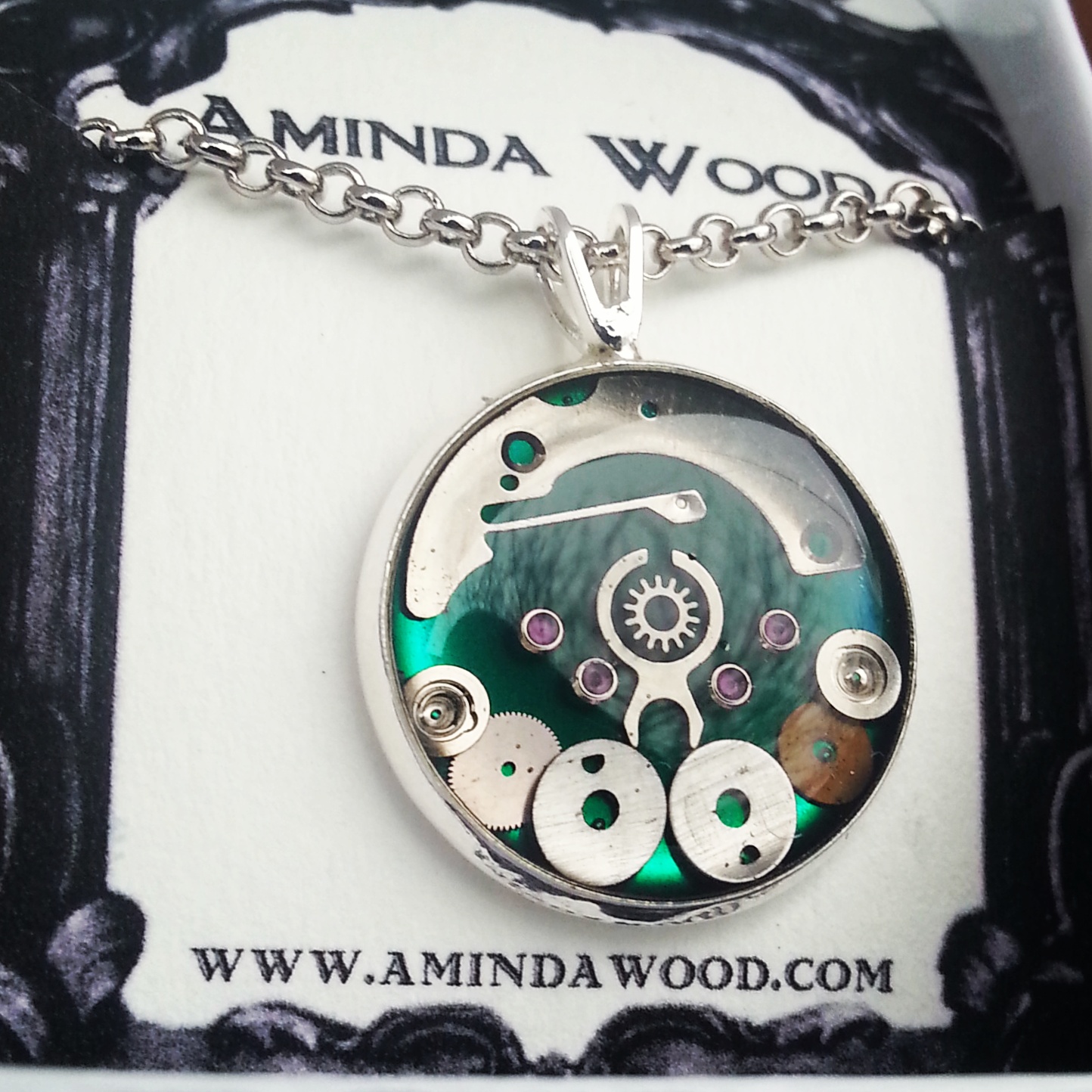These are my newest style pendants and they measure only 2.5cm in diameter! Each one contains a unique collage of watch parts.
