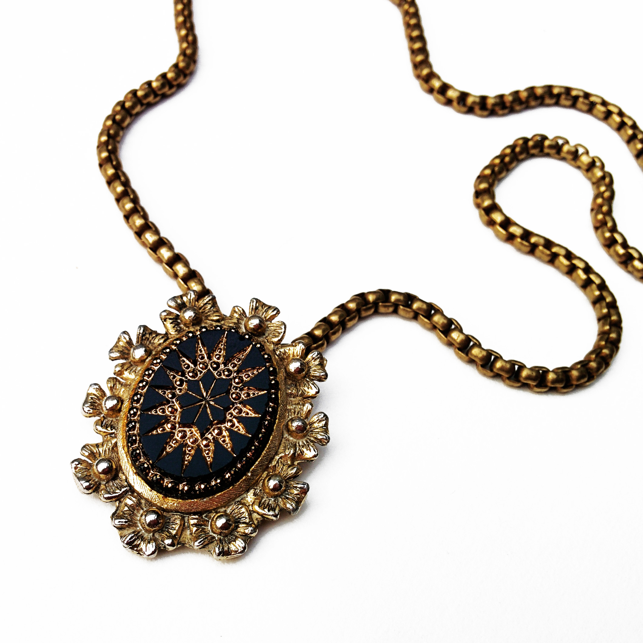 Beautiful Victorian inspired piece made using an antique scarf clip.