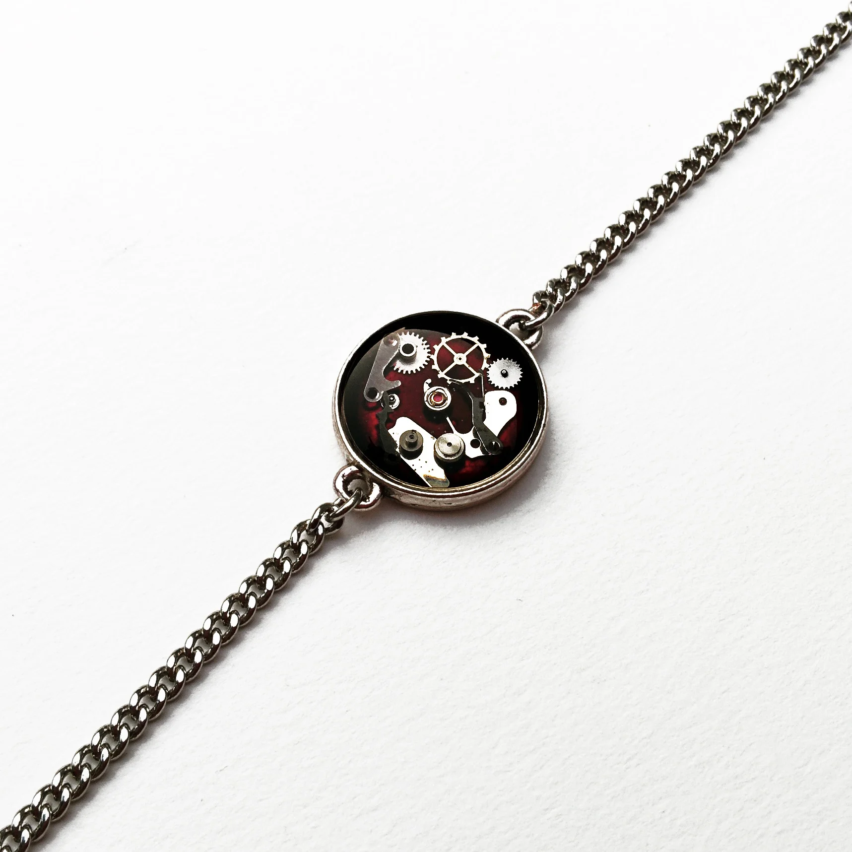New! Resin cast watch part bracelets with hand painted backgounds of varying colours!