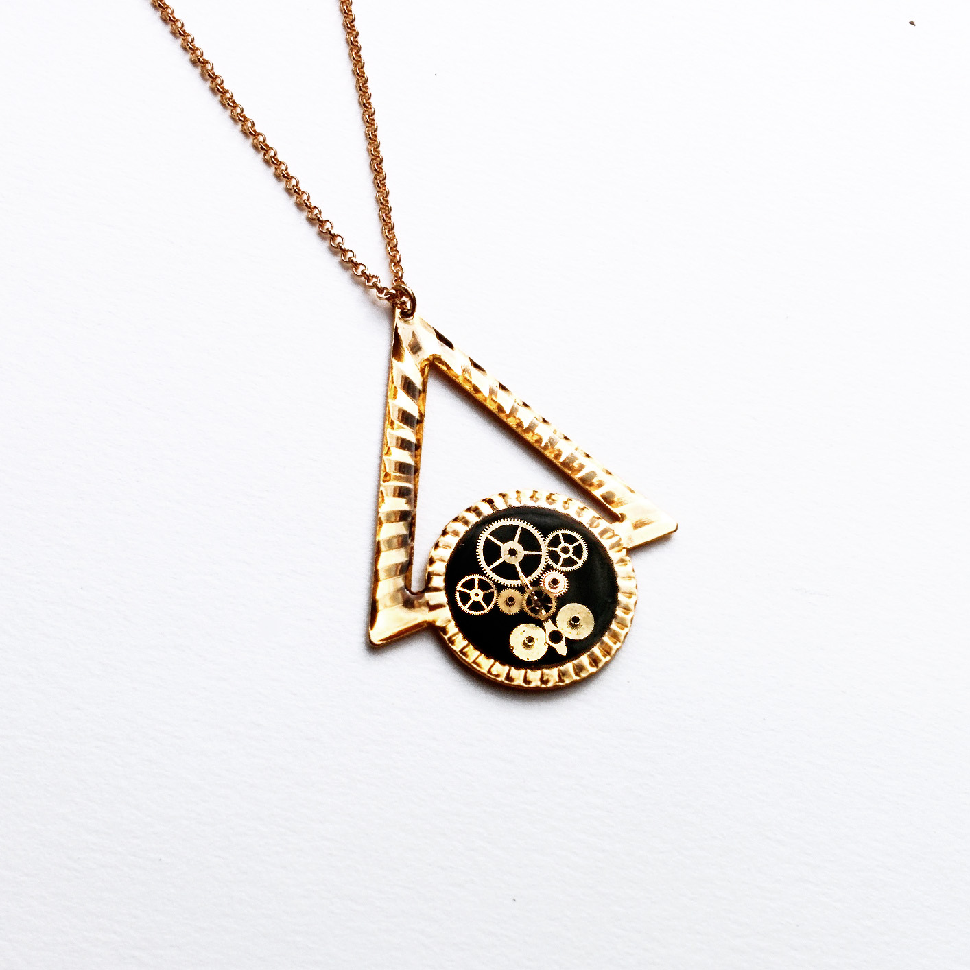 One of a kind watch part pendant made from an up cycled single earring.